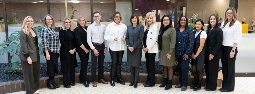 Team photo of ECSD staff with their 2025 ASBA Innovation Award