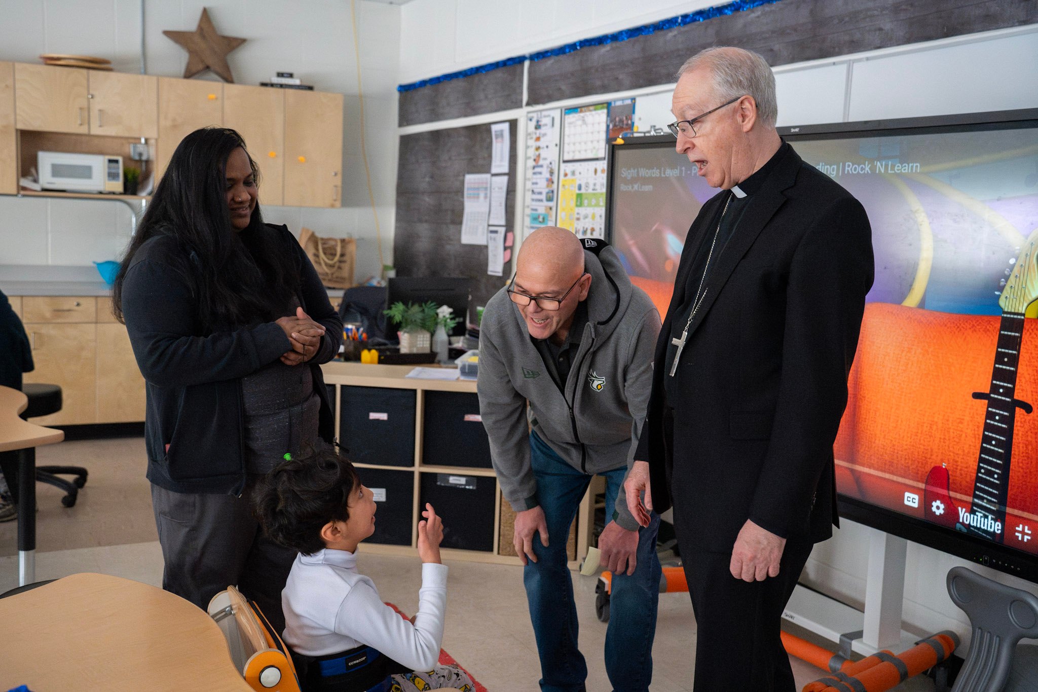 Archbishop Smith visiting an elementary school