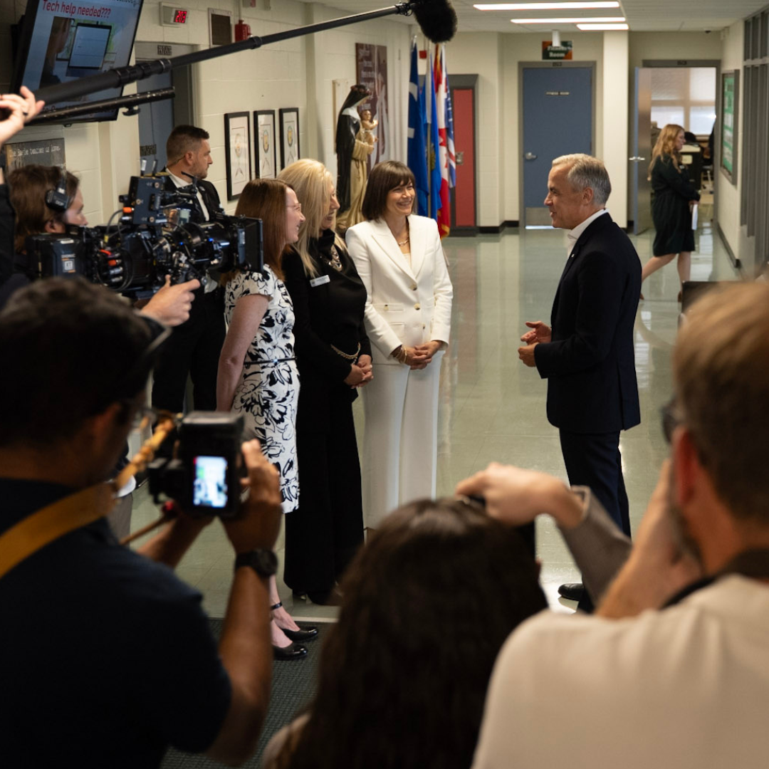 Prime Minister Mark Carney speaks with ECSD leadership at St Rose Catholic Junior High School