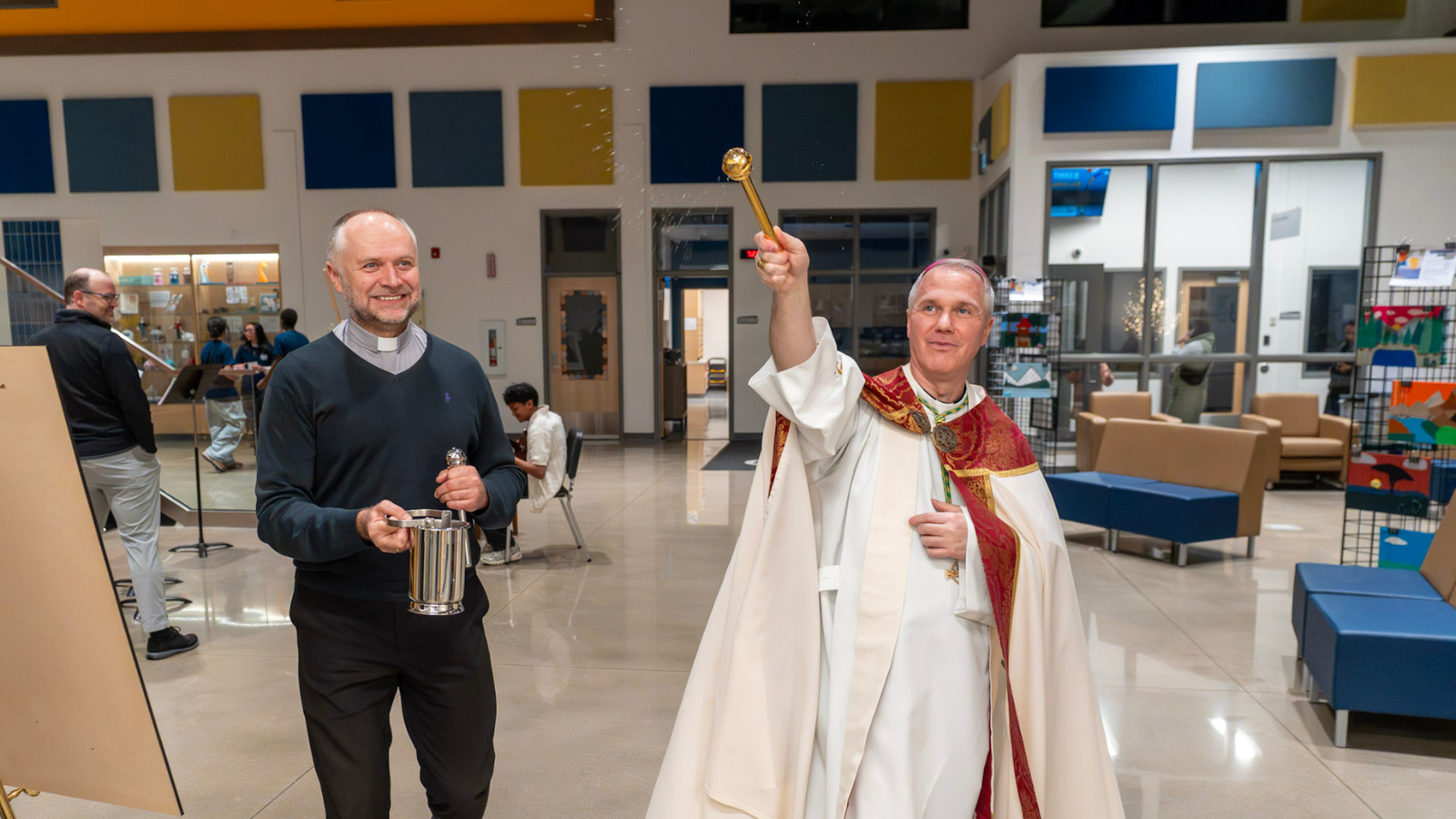 Archbishop Hero and Father Julian blessing St. Josephine Bahkita School
