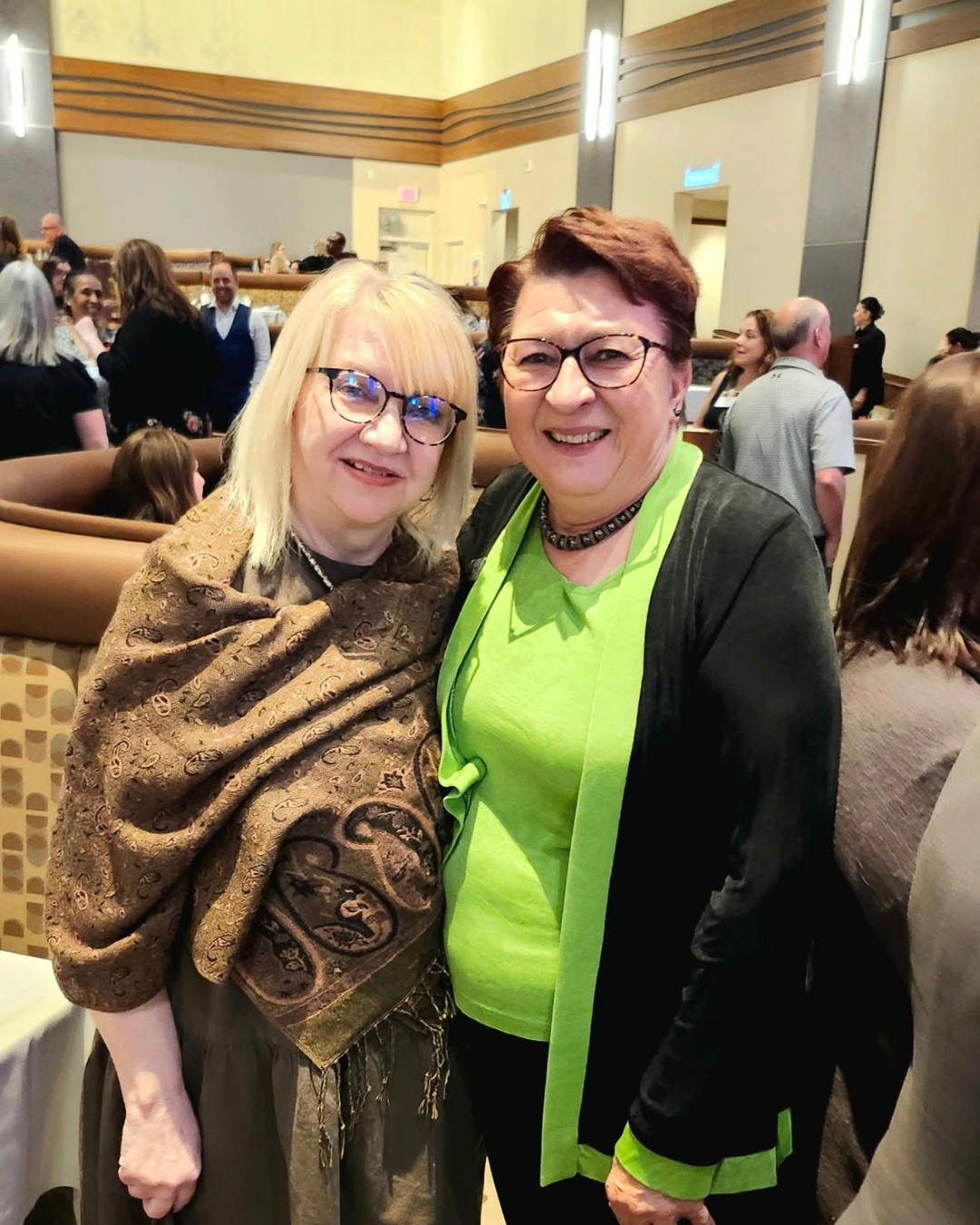 Trustee Mutala with a Long Service recipient 