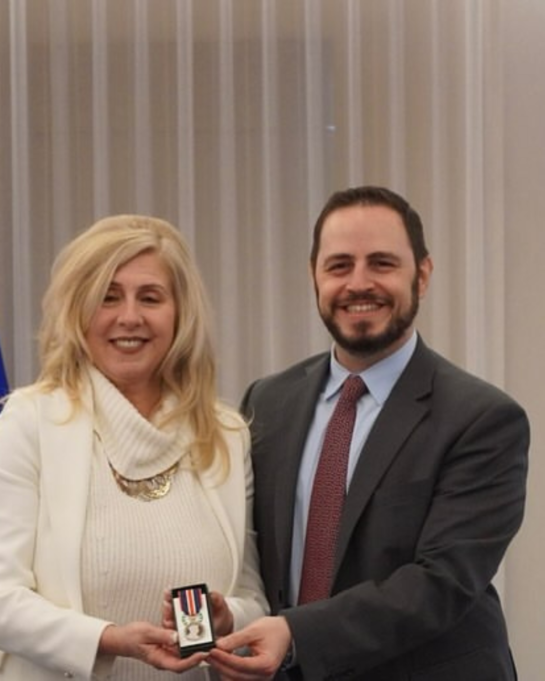 Trustee Palazzo posing with Minister of Education with King Charles III’s Coronation Medal