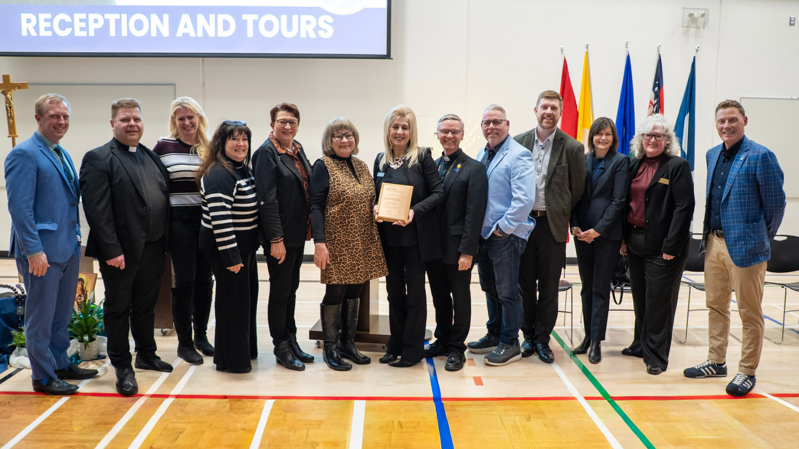 Ministers, MLA, City Councillor, and Board of Trustees in a group photo